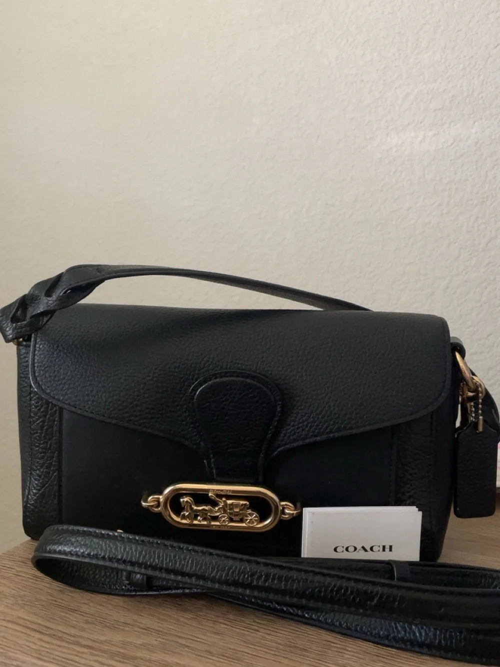 Coach Black Leather Shoulder Bag with Gold-Tone Horse & Carriage Hardware